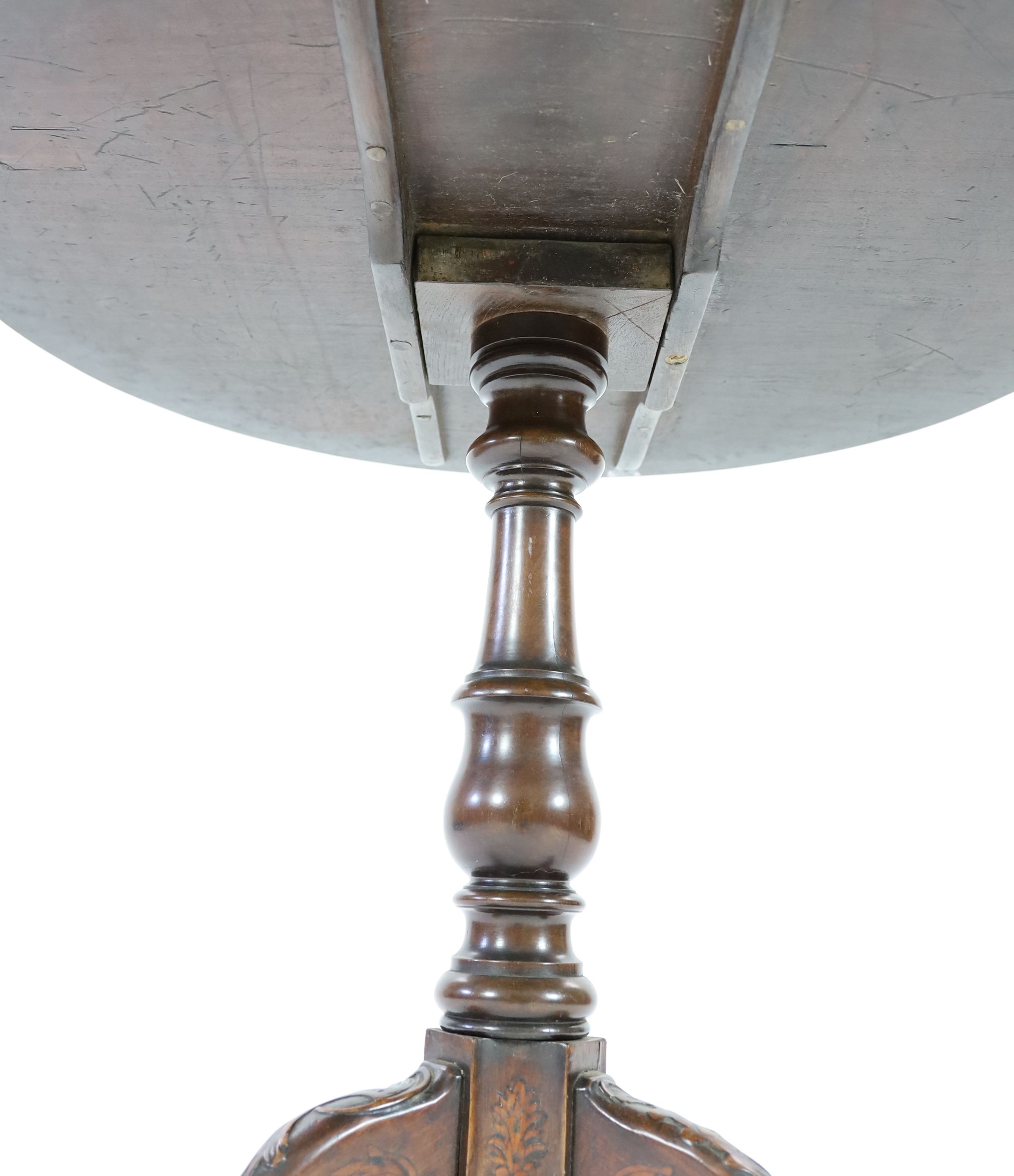 A mid to late 18th century Dutch marquetry inlaid walnut tripod table, Diam.83cm H.72cm